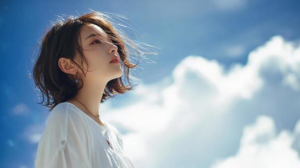 晴れた空の下、女性の美 晴れた空の下、女性の美の写真