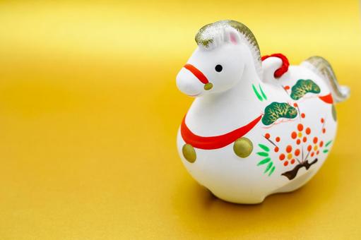 金の背景と午の土鈴 年賀状,午,お正月の写真素材