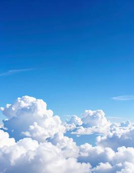青空と雲が奏でる軽やかな縦構図 青空と雲が奏でる軽やかな縦構図の写真