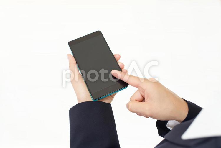 スマートフォンを操作する手 スマートフォン,携帯電話,手の写真素材
