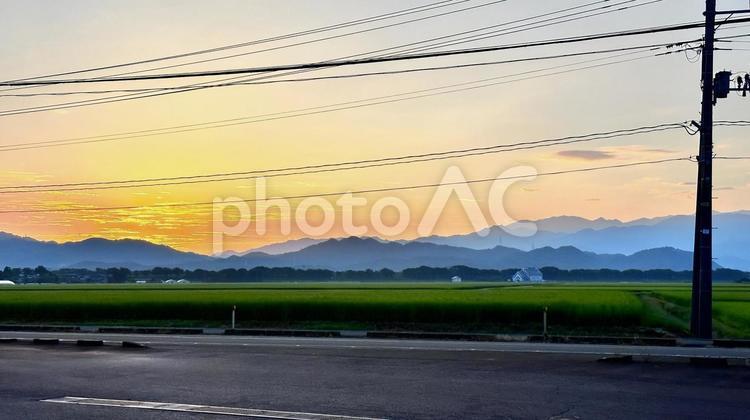 朝日が昇る新潟県 新潟県,新潟市,朝日の写真素材
