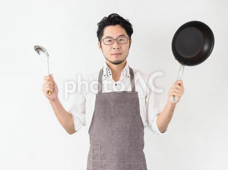 料理に意欲的な男性のイメージ パパ,家事,料理の写真素材