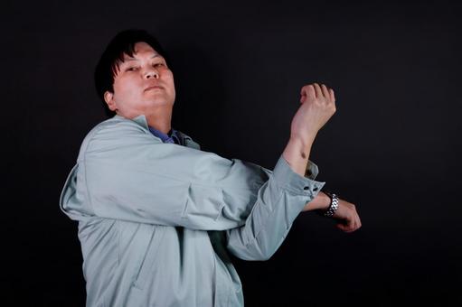 腕を伸ばす男性 腕を伸ばす男性 男性,腕,ストレッチの写真素材