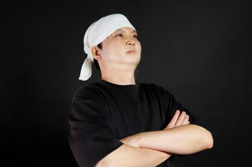 決意の表情の男性 決意の表情の男性 男性,若者,黒い服の写真素材