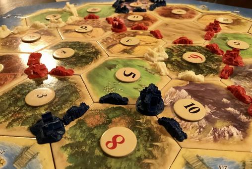 六角タイルが並ぶ資源開拓ゲーム 六角タイルが並ぶ資源開拓ゲーム ボードゲーム,六角形,タイルの写真素材