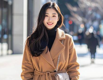 冬の朝・コートで出勤の彼女の写真