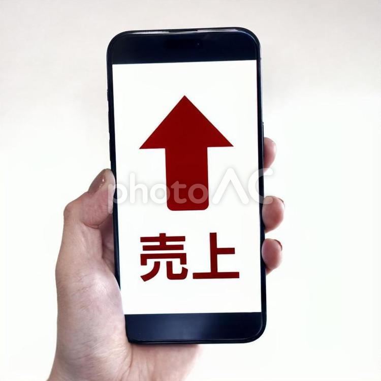 スマホで売上が上がるイメージ スマホ,スマートフォン,スマホ画面の写真素材