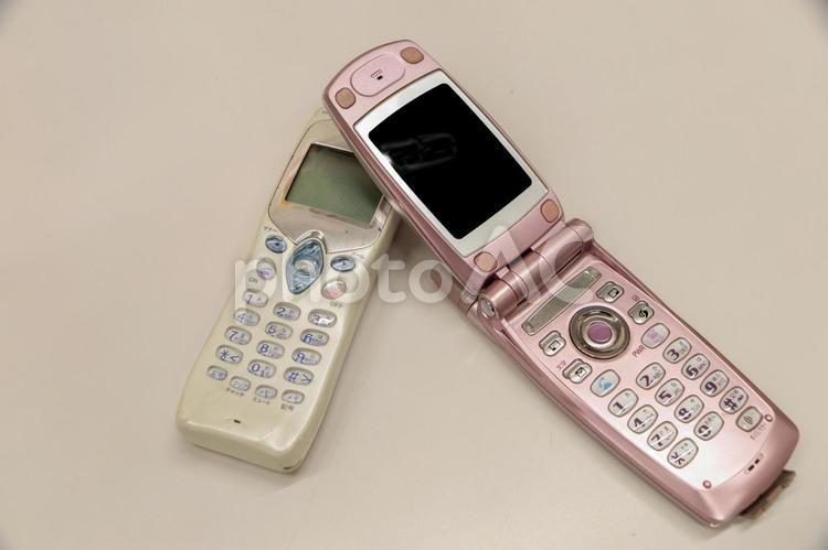 旧式の懐かしい携帯電話 電話,受話器,ビジネスの写真素材