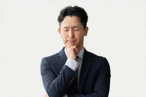 考えごとをする男性ビジネスマン 考えごとをする男性ビジネスマン 男性,考える,悩むの写真素材