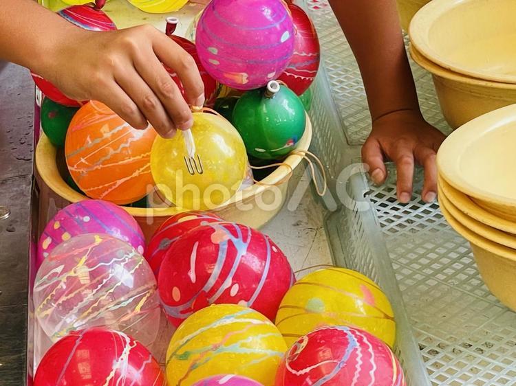 夏の風物詩　祭りのヨーヨーつり屋台 夏,祭り,天神祭りの写真素材