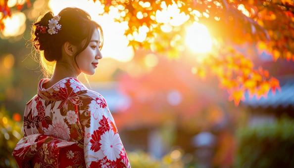 紅葉を眺める晴れ着姿の女性のポートレートの写真