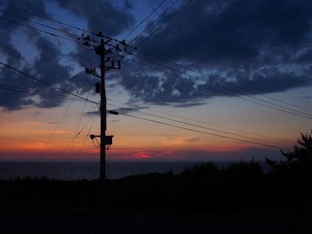 夕日と電信柱 夕日と電信柱の写真