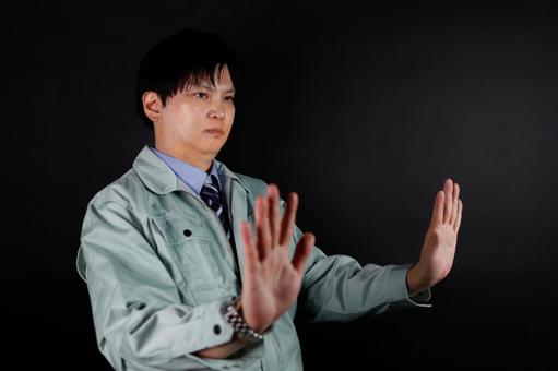 作業服の男性のストップサイン 作業服の男性のストップサイン 男性,作業服,ストップの写真素材