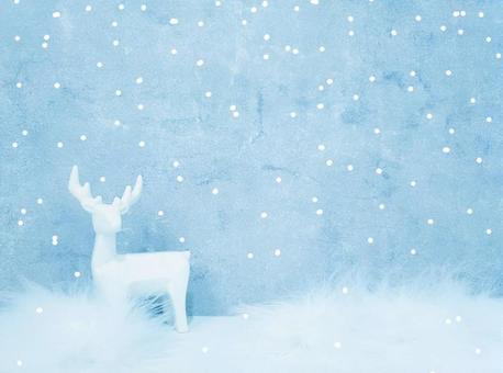 雪が降るトナカイの冬のフレーム背景  雪が降るトナカイの冬のフレーム背景 の写真