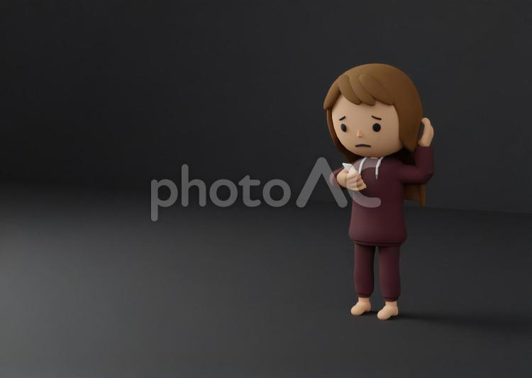 スマホを見て困るニート女性 sns,炎上,ツイッターの写真素材