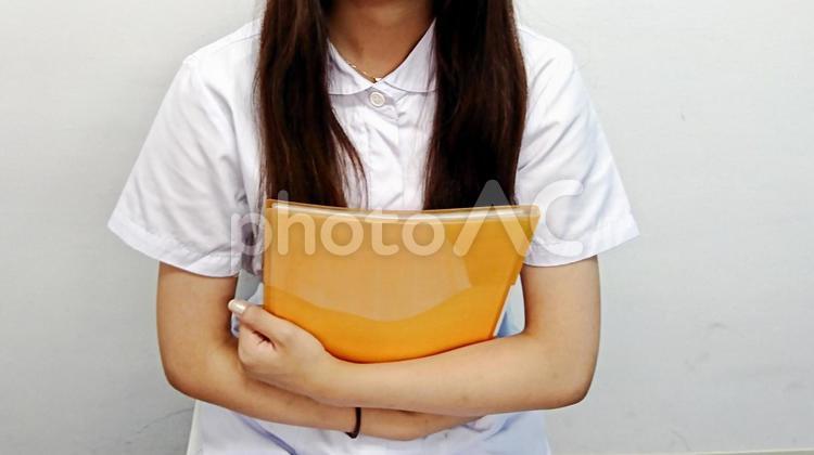 仕事の準備をする看護師 看護師,女性,新人の写真素材