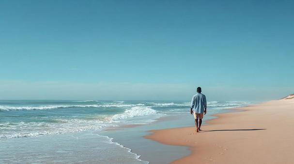 青い空と海：リラックスしたビーチウォークの写真