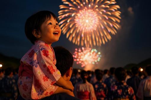 肩車で花火を見る親子 肩車で花火を見る親子の写真