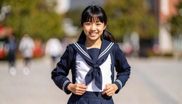 学校に通うセーラー服姿の女の子 学校に通うセーラー服姿の女の子の写真