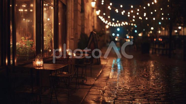夜のテラスと灯りの街_1 夜,カフェ,テラスの写真素材