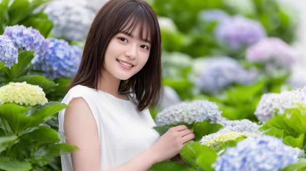 アジサイと白いワンピースの女性 アジサイと白いワンピースの女性の写真