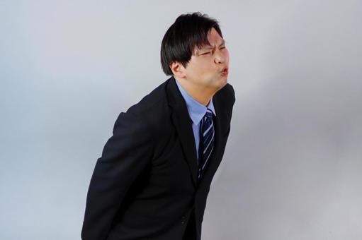 苦しむビジネスマンの姿 苦しむビジネスマンの姿 ビジネスマン,男性,スーツの写真素材