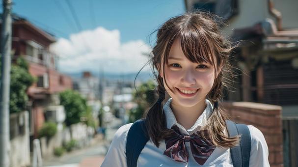 笑顔で歩く女子高生 笑顔で歩く女子高生の写真