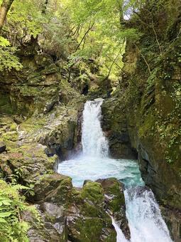 Rocky waterfall and forest scenery, JPG Rocky waterfall and forest scenery, JPG