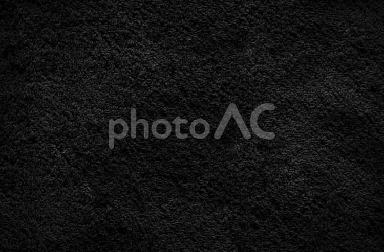 黒色のタオル生地のテクスチャ 黒,黒色,ふっくらの写真素材