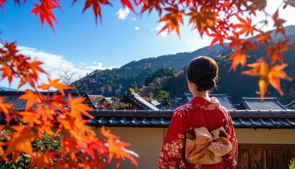 紅葉の秋の風景と着物を着た女性 紅葉の秋の風景と着物を着た女性の写真