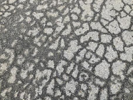 アスファルトの亀裂テクスチャー アスファルトの亀裂テクスチャー アスファルト,亀裂,テクスチャーの写真素材