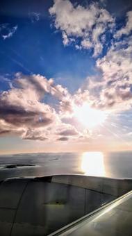 機内からの夕日 機内からの夕日の写真