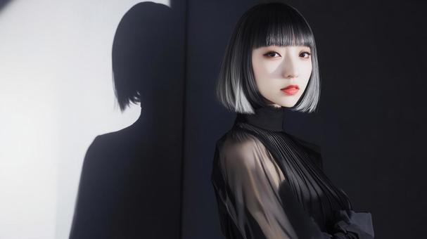 黒いドレスを着たボブヘアーの魅惑的な女性 黒いドレスを着たボブヘアーの魅惑的な女性の写真