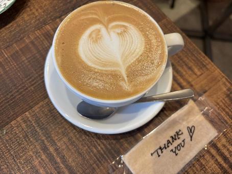 カフェラテ_おしぼり ラテアート,コーヒー,カフェラテの写真素材