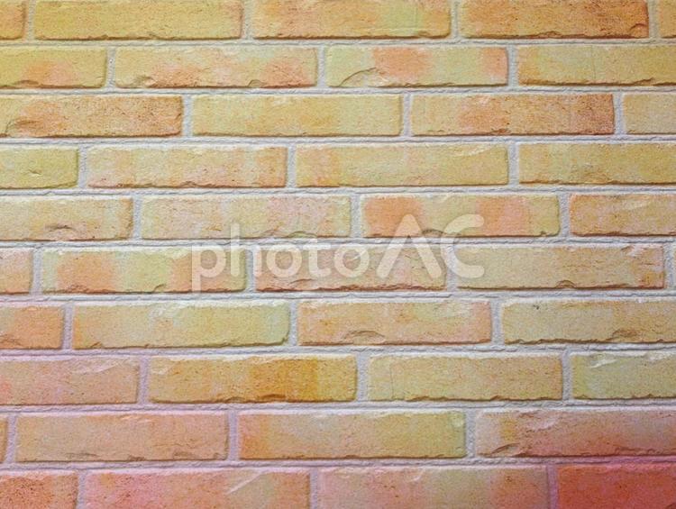 メルヘンチックなレンガ壁　暖かな背景素材 レンガ,壁,メルヘンの写真素材