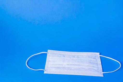 Simple mask on blue background, JPG Simple mask on blue background, JPG