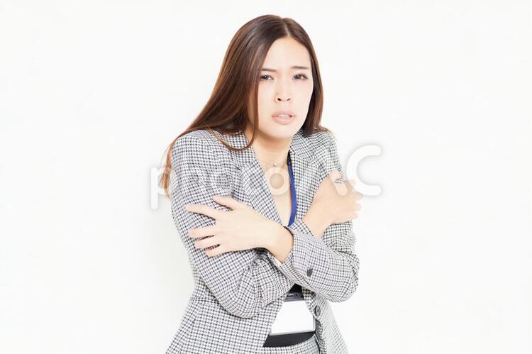 風邪で体調が悪いビジネスウーマン 女性,健康,体調不良の写真素材