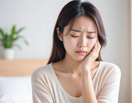 体調不良の女性 体調不良の女性の写真