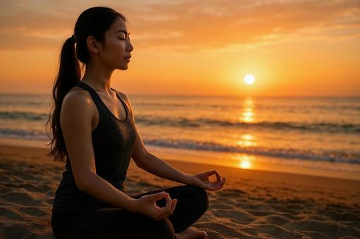 夕日を浴びて瞑想する女性の美しい横顔の写真