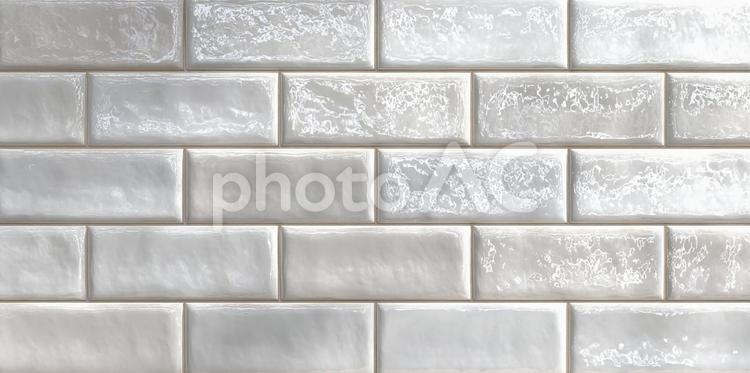 光沢のあるつるつるとした白い壁 タイル,タイル壁,テクスチャの写真素材