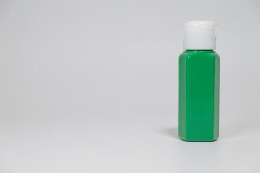 緑のプラスチックボトル 緑のプラスチックボトル ボトル,プラスチック,緑色の写真素材