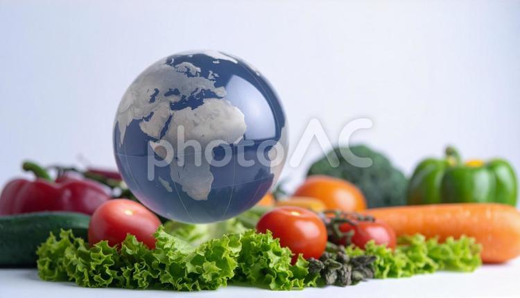 ガラスの地球と野菜盛り合わせ 野菜,地球,植物の写真素材