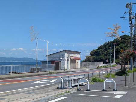 例祭前の夏の海沿いの道 例祭前の夏の海沿いの道 神社,例祭,夏の写真素材