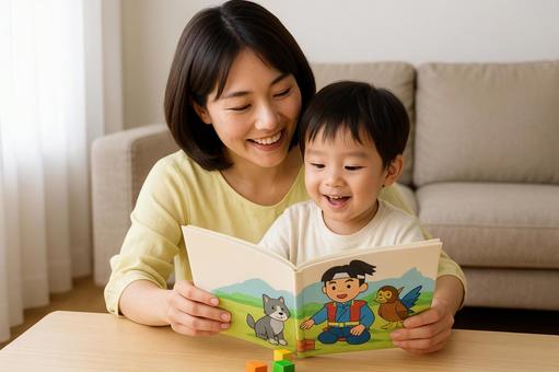 子育て 絵本の読み聞かせをする女性 子育て 絵本の読み聞かせをする女性の写真