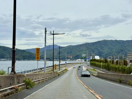 京都の舞鶴周辺の海沿いの道路 ハイウェイ,海沿い,京都の写真素材
