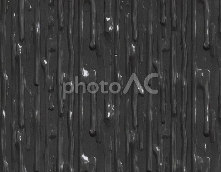 黒いワックスの縦流れ模様 ワックス,黒,縦の写真素材