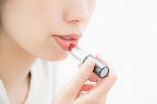 口紅を塗る女性 リップ,口紅,美容の写真素材