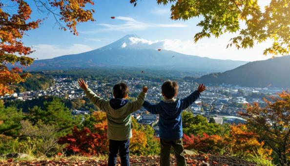 紅葉のなかで遊ぶ子供たち 紅葉のなかで遊ぶ子供たちの写真
