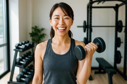 フィットネス女子の笑顔の写真