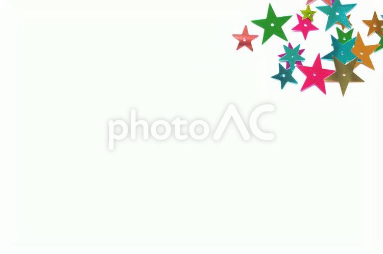 星型のスパンコール　カラフル　キラキラ　白背景素材 星型,スパンコール,カラフルの写真素材